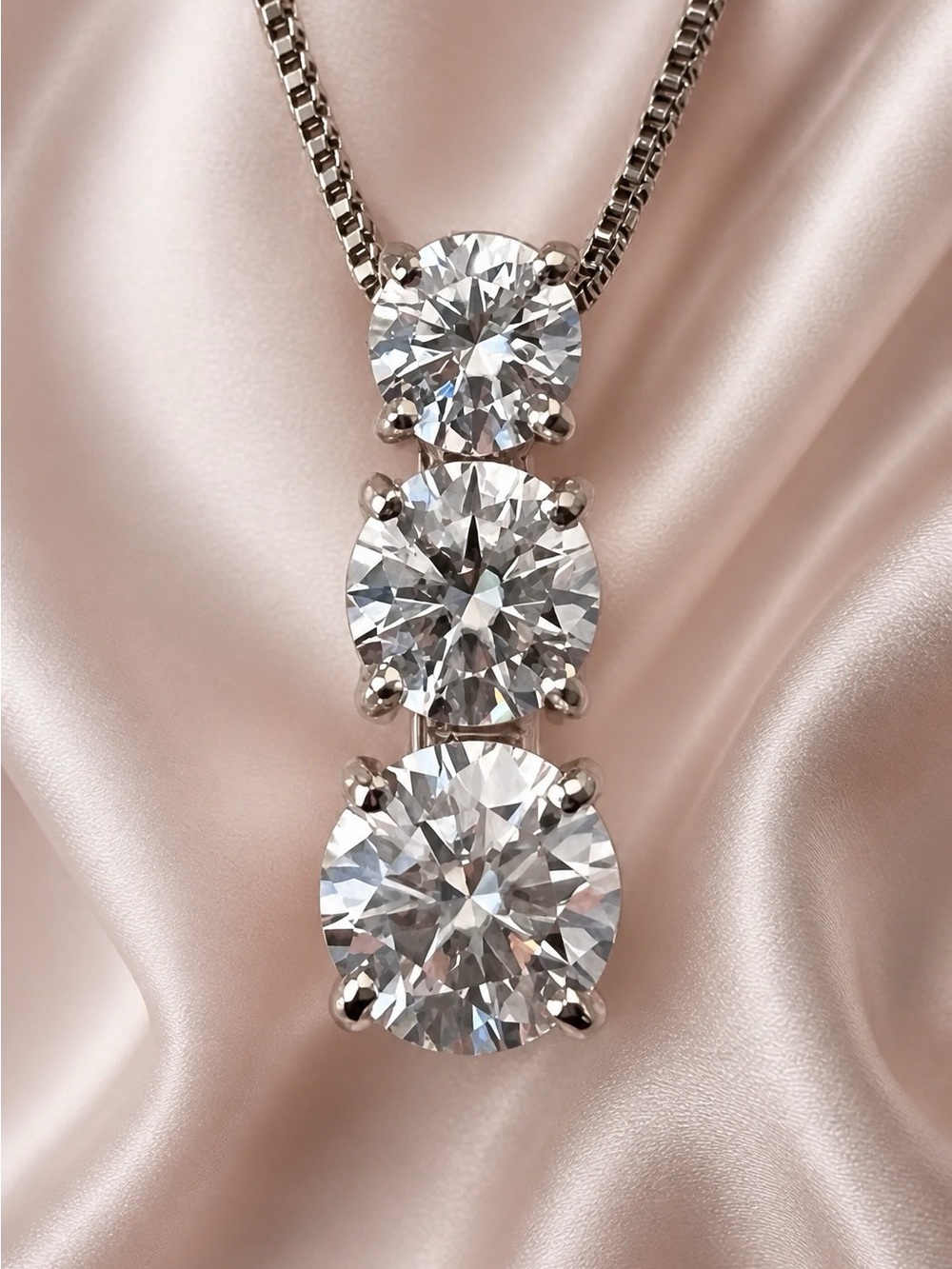 Triple AAA Moissanite Gemstones, rhodium over 925 Sterling Silver, 18” chain.